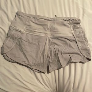 Lululemon 4 inch white stained speed-ups.